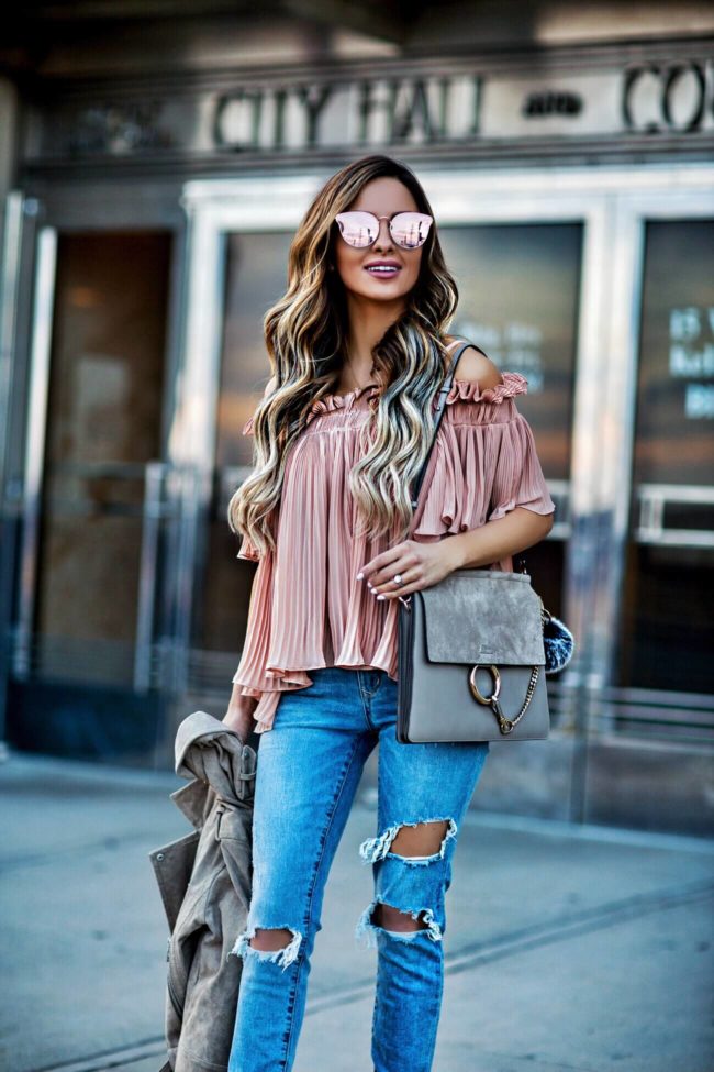 fashion blogger mia mia mine wearing a pink top from revolve and chloe faye medium bag from nordstrom