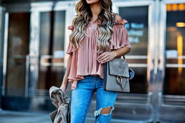 fashion blogger mia mia mine wearing a pink off-the-shoulder top from shopbop and a chloe faye bag