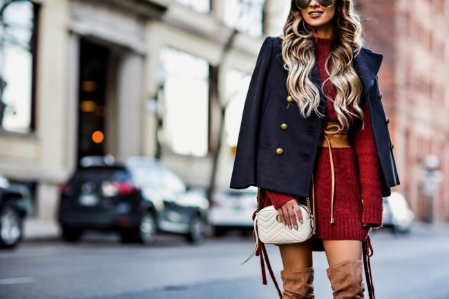 fashion blogger mia mia mine wearing a lace-up sweater dress by lovers + friends from revolve and a gucci marmont mini bag