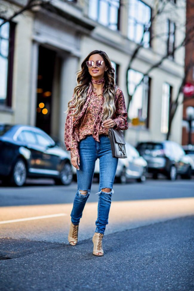 fashion blogger mia mia mine wearing a floral print top by free people and sam edelman lace-up heels