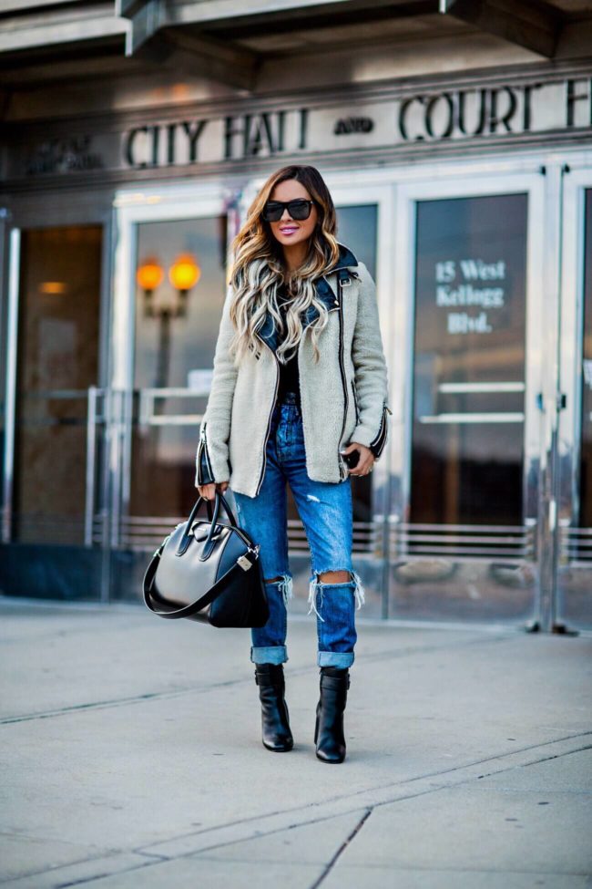 fashion blogger mia mia mine wearing a white shearling jacket and a givenchy bag from nordstrom