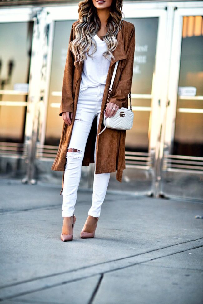 fashion blogger mia mia mine carrying a gucci marmont white bag