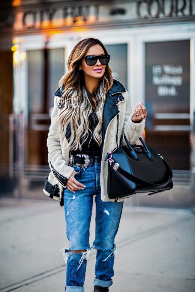 fashion blogger mia mia mine wearing a shearling jacket from asos and a givenchy antigona bag