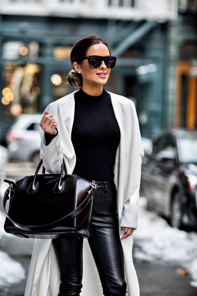 fashion blogger mia mia mine wearing a white coat from missguided and a givenchy antigona bag from nordstrom in new york city