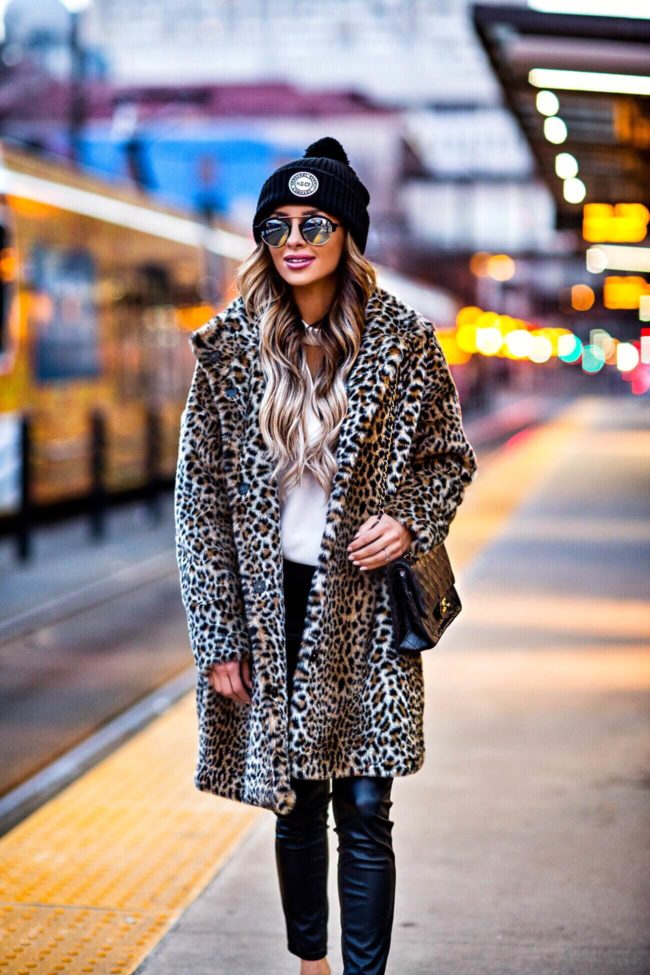 fashion blogger mia mia mine wearing a leopard coat and leather pants from shopbop