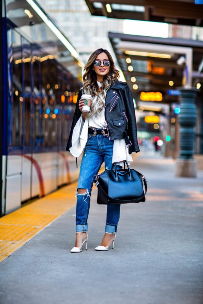 fashion blogger mia mia mine wearing grlfrnd jeans from revolve and a givenchy antigona bag