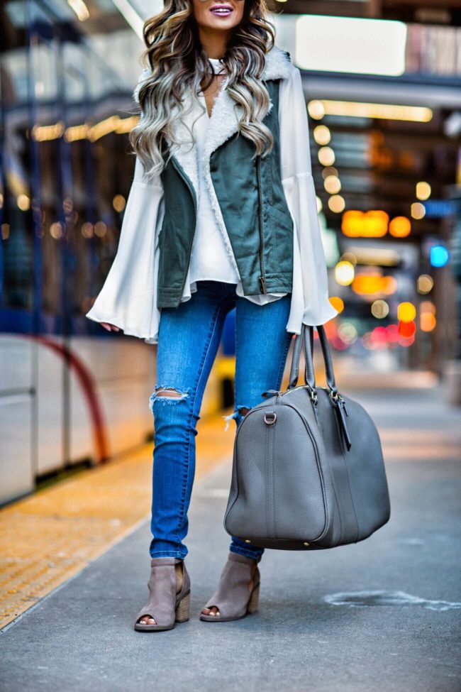 fashion blogger mia mia mine wearing a sole society bag and booties 