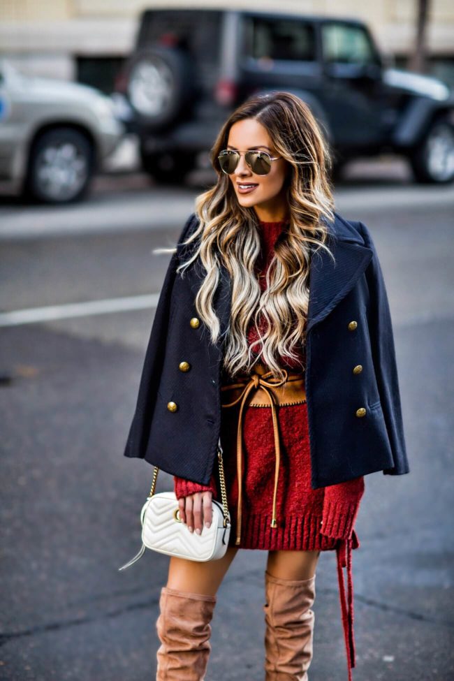 fashion blogger mia mia mine wearing a lace-up sweater dress by lovers + friends from revolve and a gucci white marmont bag