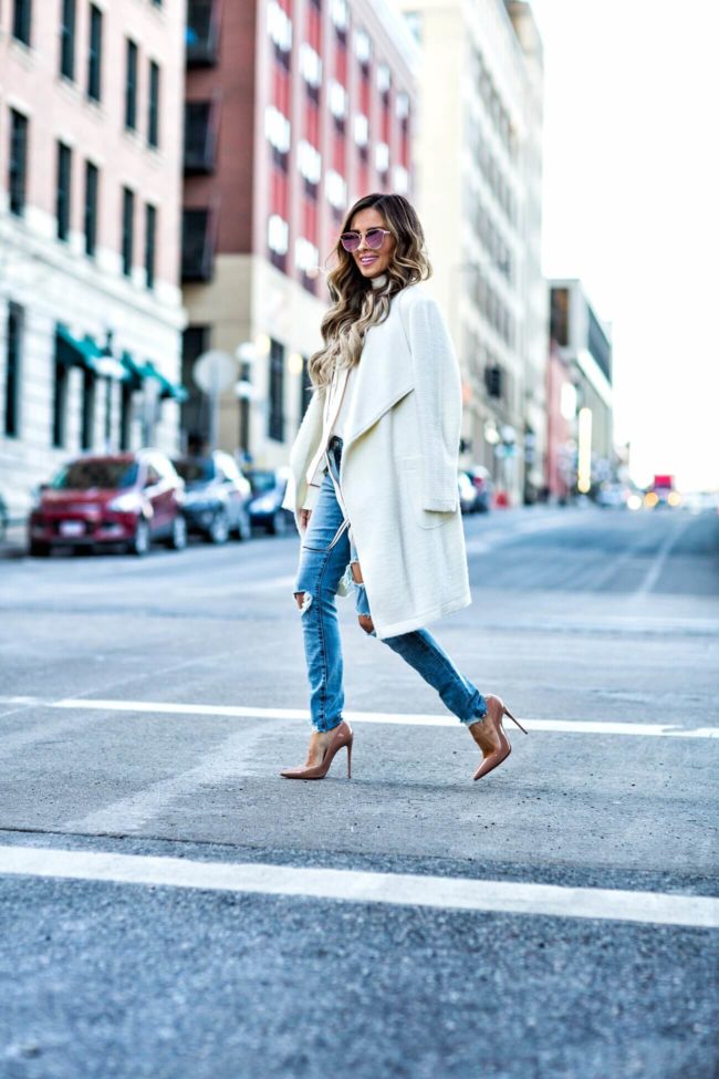 fashion blogger mia mia mine wearing a cream sweater from nordsrom and christian louboutin so kate heels