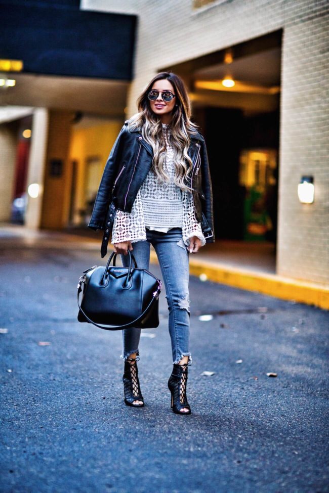 fashion blogger mia mia mine wearing an eyelet top and leather jacket from nordstrom with sam edelman lace-up booties