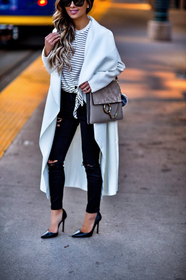 fashion blogger mia mia mine wearing a chloe faye medium bag and topshop black jeans 