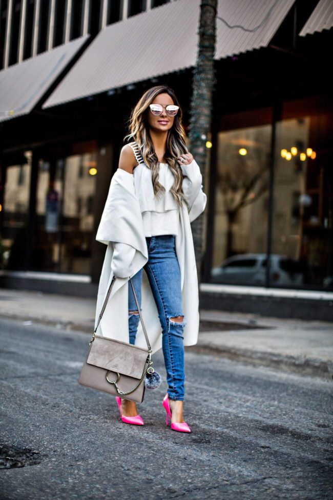 fashion blogger mia mia mine wearing a white duster coat by missguided and rollas jeans from revolve