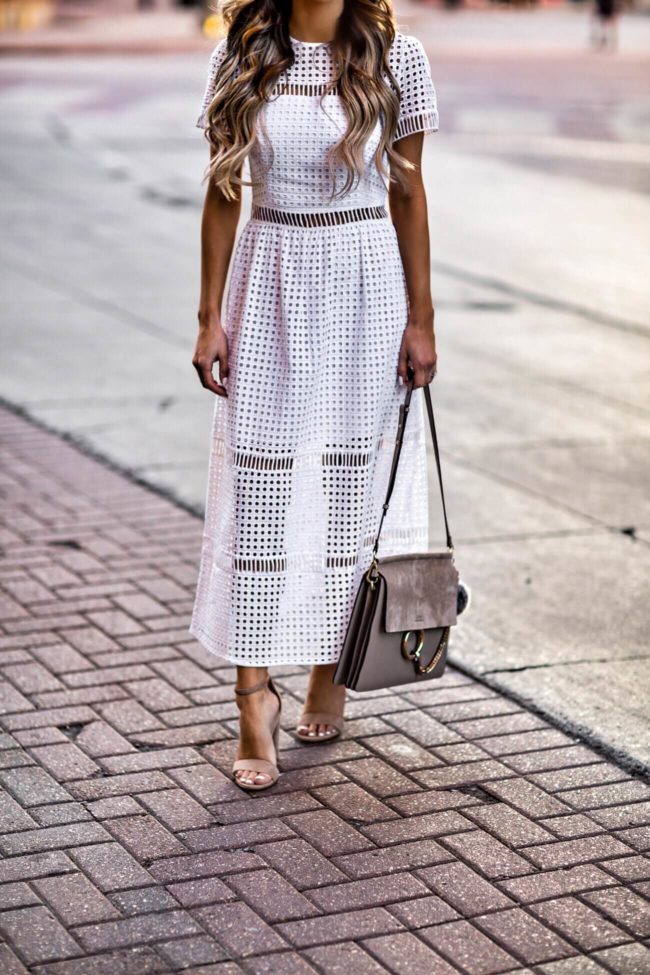 mn fashion blogger mia mia mine wearing a white eyelet dress from bebe and sam edelman suede heels
