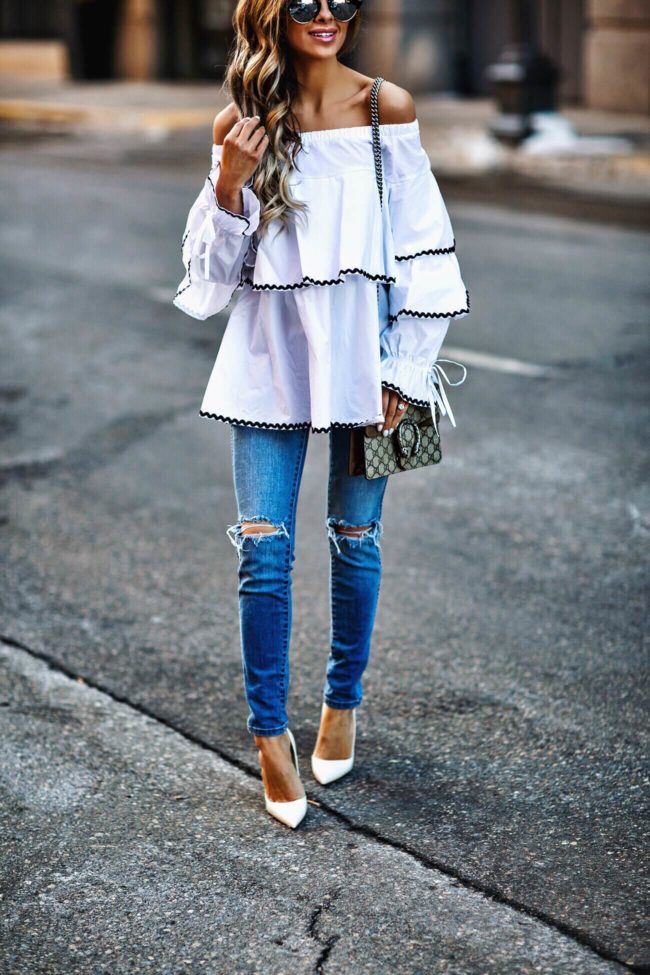 fashion blogger mia mia mine wearing skinny jeans by rollas from revolve and a gucci bag