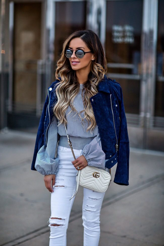 fashion blogger mia mia mine wearing a bebe striped navy and white top and illesteva sunglasses