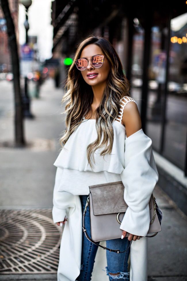 fashion blogger mia mia mine wearing a white coat and white top from nordstrom