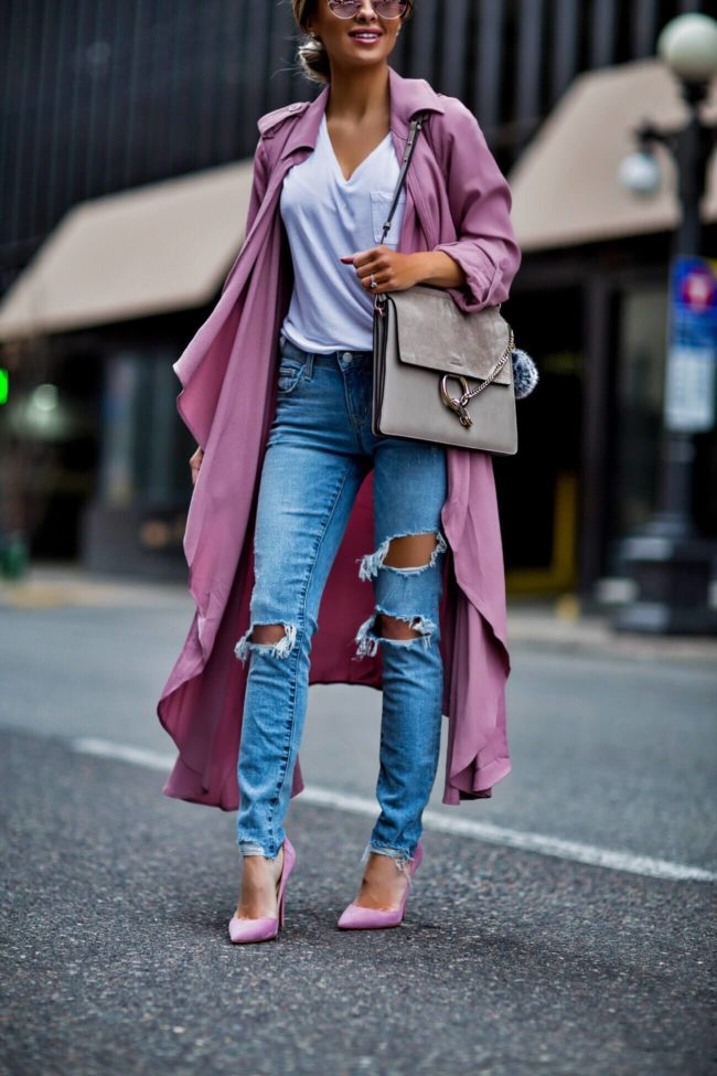 fashion blogger mia mia mine wearing lovers + friends jeans and a pink trench coat from shopbop