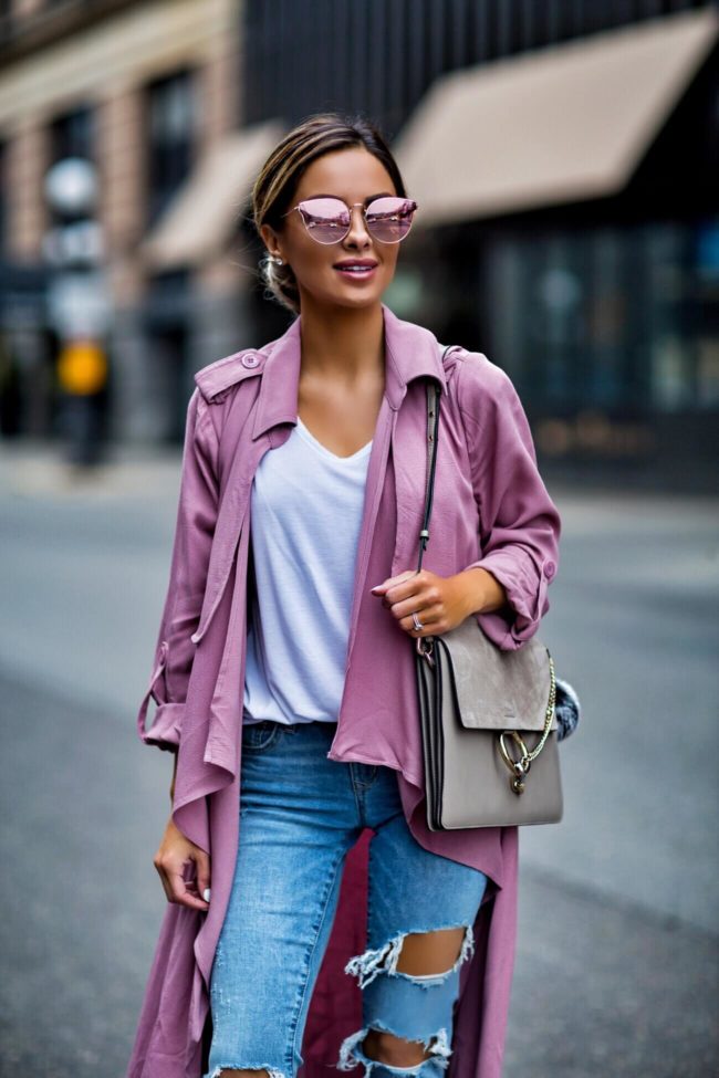 fashion blogger mia mia mine wearing a pink line and dot trench coat from shopbop
