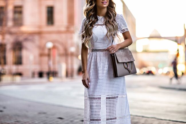 fashion blogger mia mia mine wearing a white eyelet dress from bebe and sam edelman heels