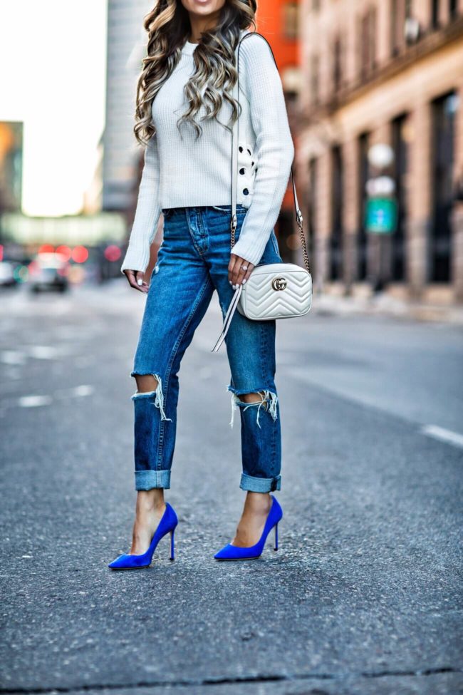 Fashion blogger mia mia mine wearing blue jimmy choo heels and a gucci marmont bag