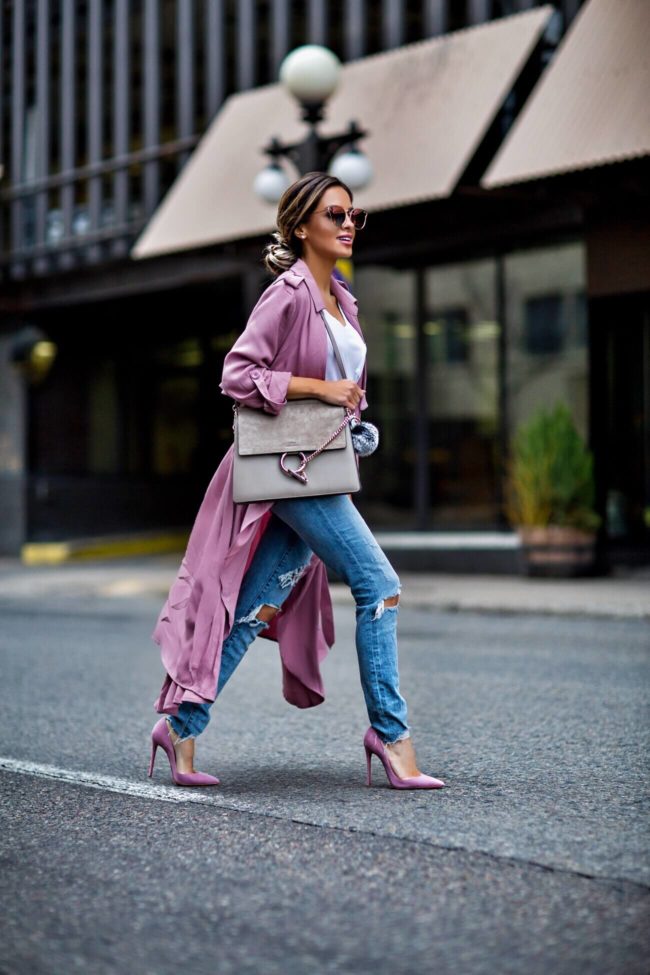 fashion blogger mia mia mine wearing a pink trench coat and pink louboutin heels 