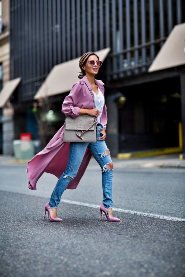 fashion blogger mia mia mine wearing a pink line and dot trench coat from shopbop