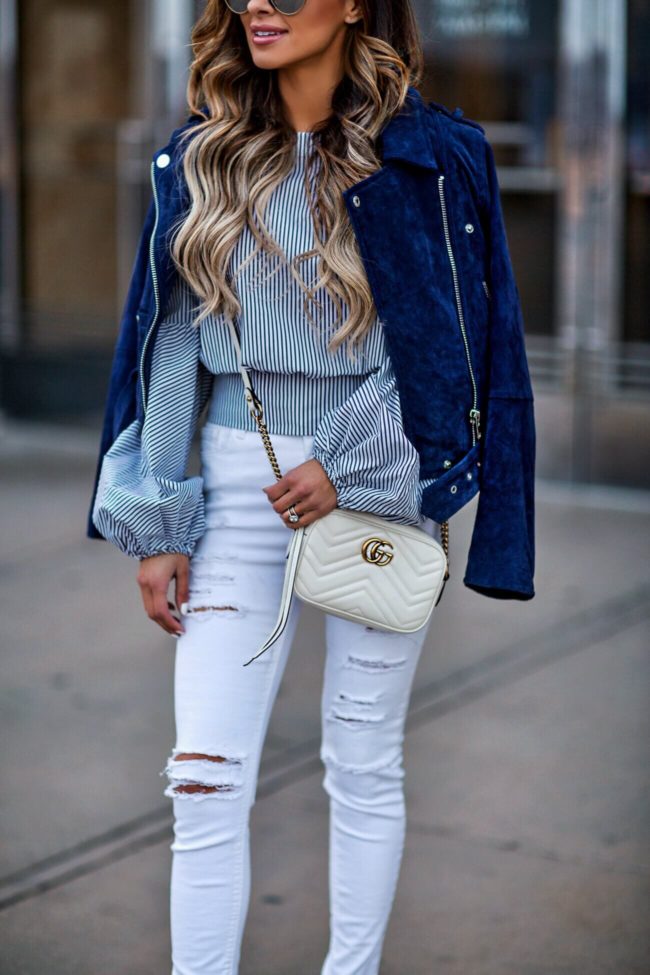 fashion blogger mia mia mine wearing a bebe striped top and gucci marmont bag