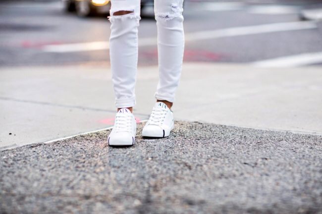fashion blogger mia mia mine wearing white armani exchange sneakers from amazon