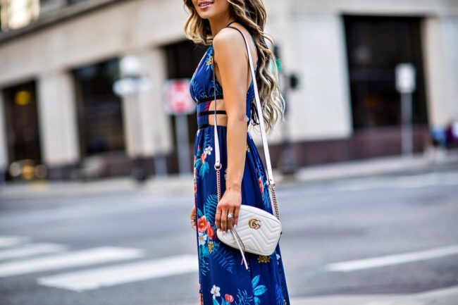 fashion blogger mia mia mine wearing a blue maxi dress from express