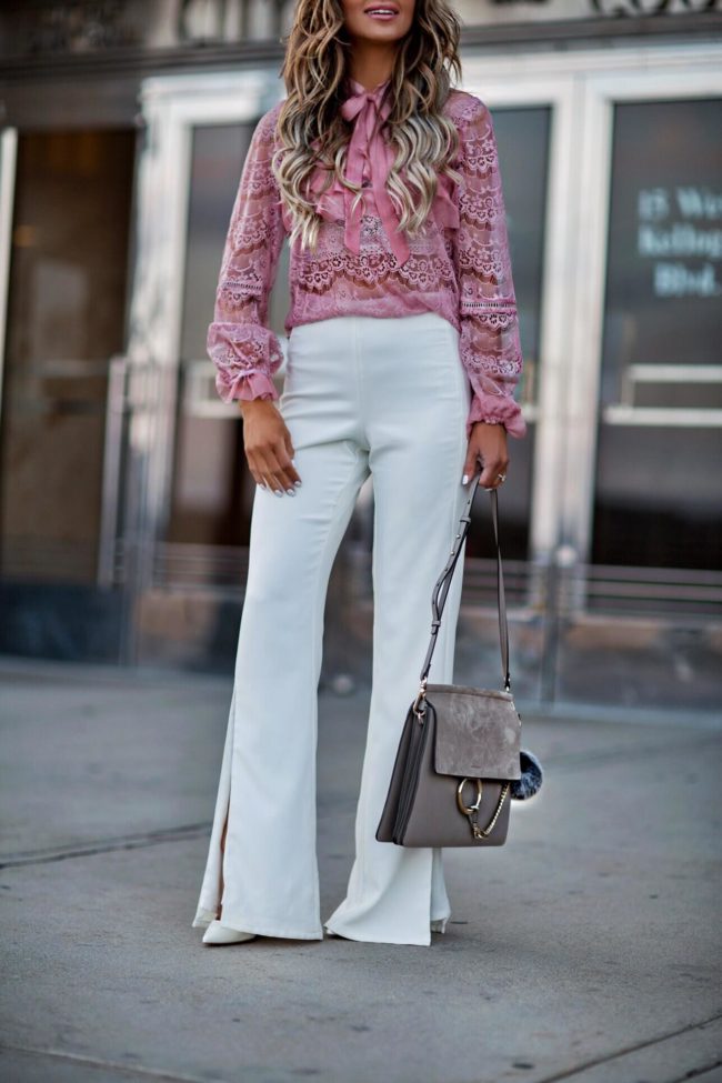 fashion blogger mia mia mine wearing white pants from revolve and a chloe faye bag