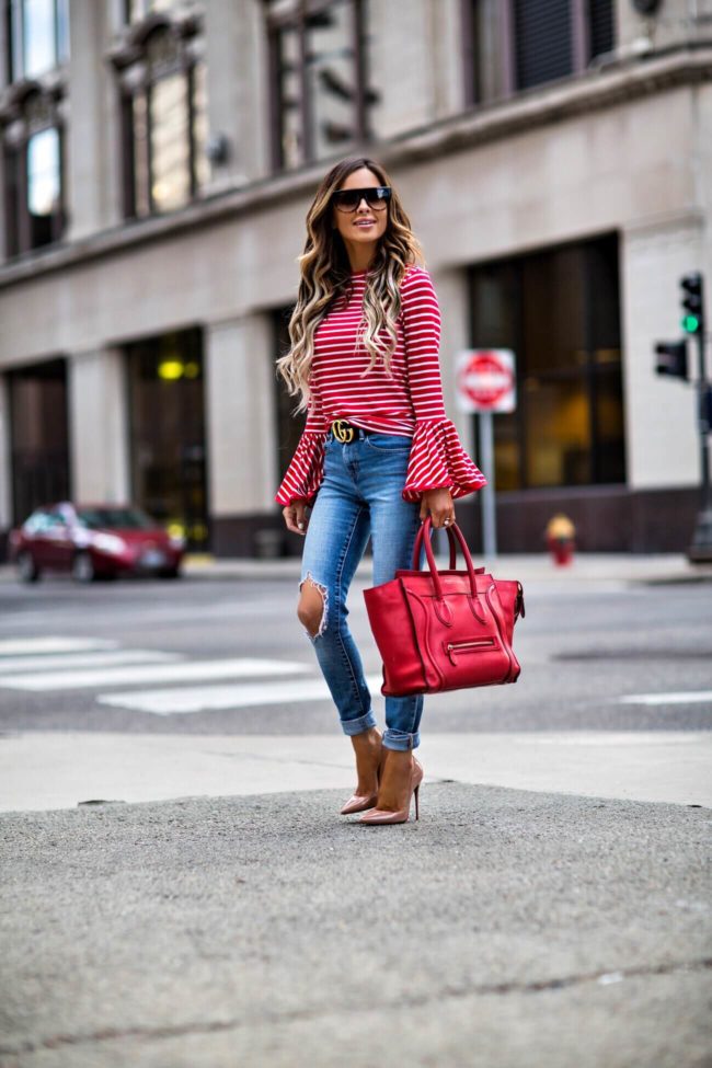 fashion blogger mia mia mine wearing a red stripe top and christian louboutin so kate heels