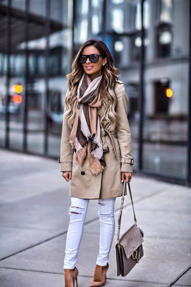 fashion blogger mia mia mine wearing a burberry trench coat and scarf with saint laurent sunglasses from nordstrom