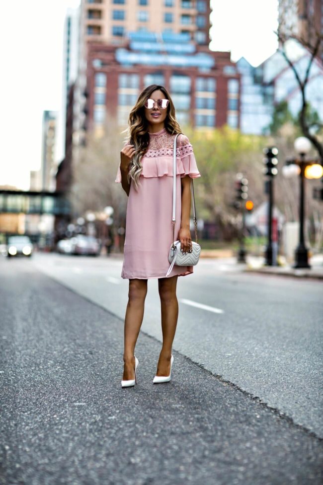 fashion blogger mia mia mine wearing a blush pink dress from express for spring