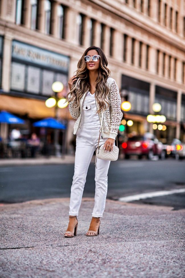 fashion blogger mia mia mine wearing white overalls and sam edelman suede heels