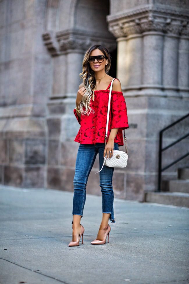 fashion blogger mia mia mine wearing step hem capri jeans and a gucci marmont bag