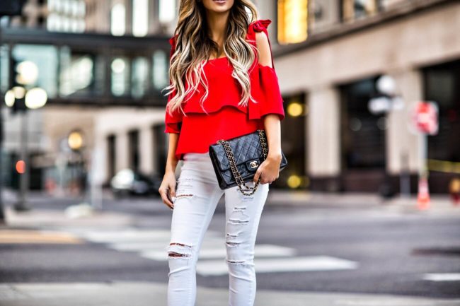 fashion blogger mia mia mine wearing a bright red shopbop top and white topshop jeans from nordstrom