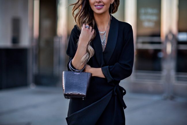 fashion blogger mia mia mine wearing a henri bendel necklace and marquis bag