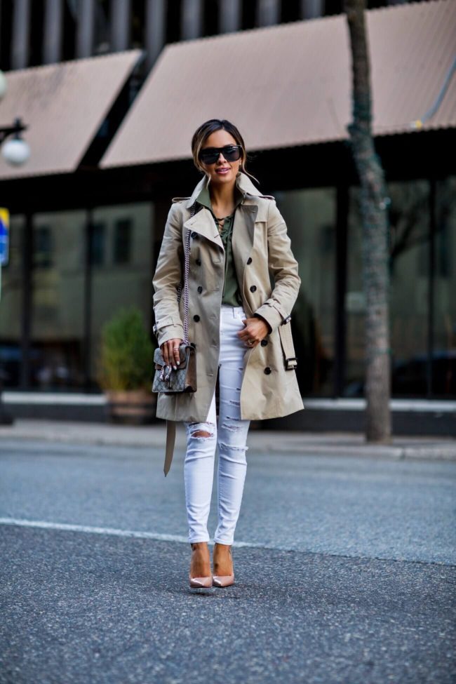 fashion blogger mia mia mine wearing a burberry trench coat and white topshop jeans from nordstrom