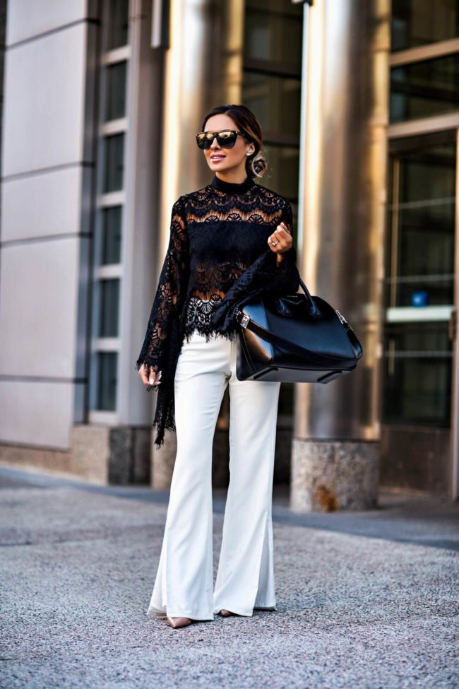 fashion blogger mia mia mine wearing lovers + friends white pants from revolve and a givenchy bag