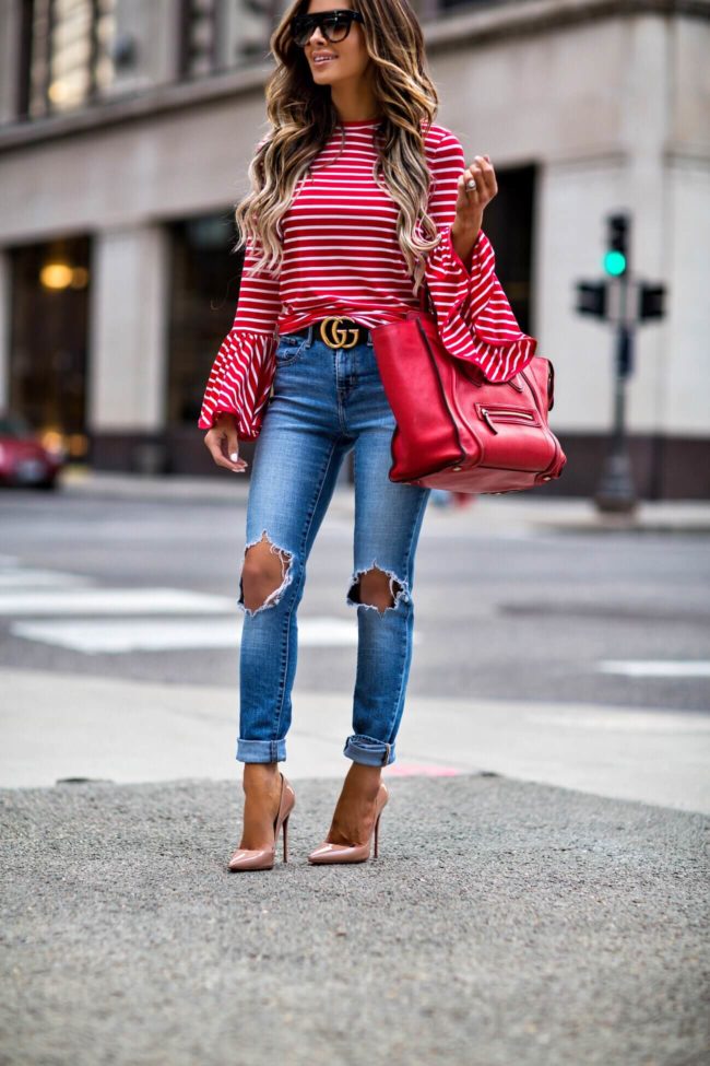 fashion blogger mia mia mine wearing christian louboutin so kate heels and a red striped bell sleeved top from shopbop
