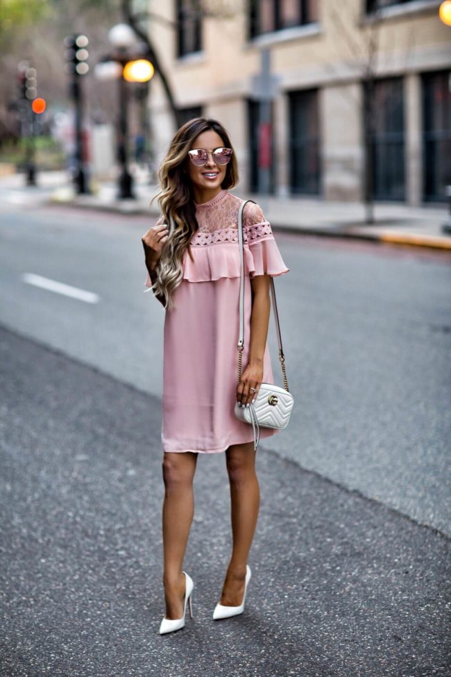 mn fashion blogger mia mia mine wearing a pink lace dress from express and a gucci marmont white bag
