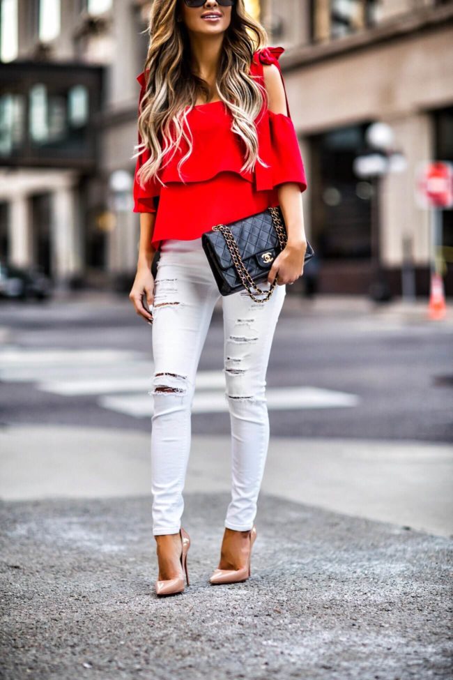 fashion blogger mia mia mine wearing red shoulder tie top and a chanel 2.55 bag
