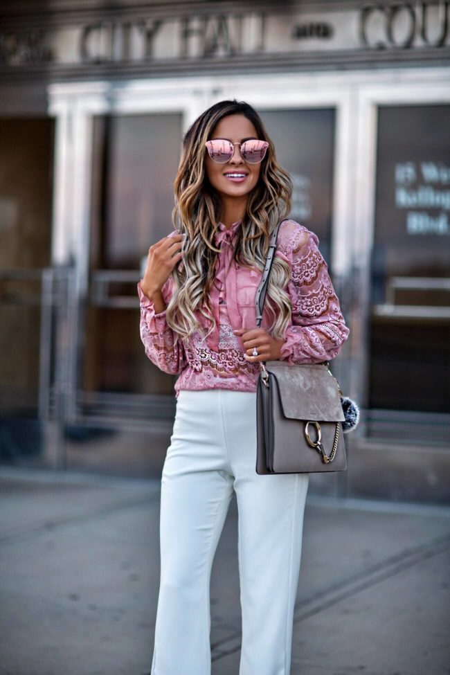 fashion blogger mia mia mine wearing a pink lace top from shopbop and a chloe faye medium bag