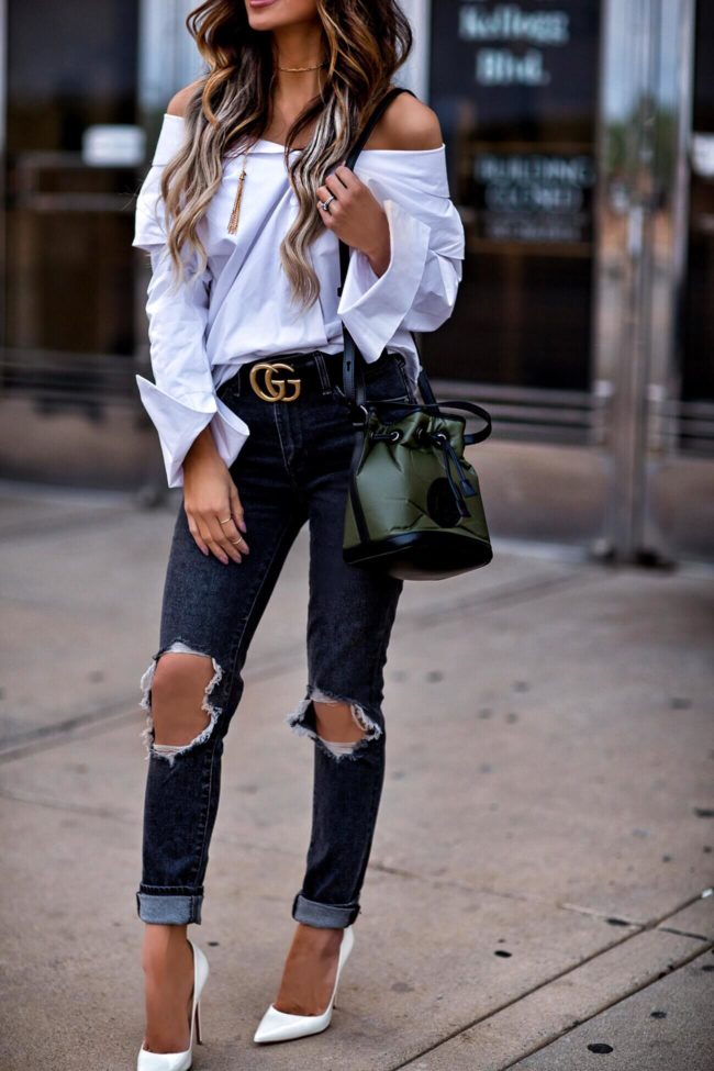 fashion blogger mia mia mine wearing a white button down and a gucci belt