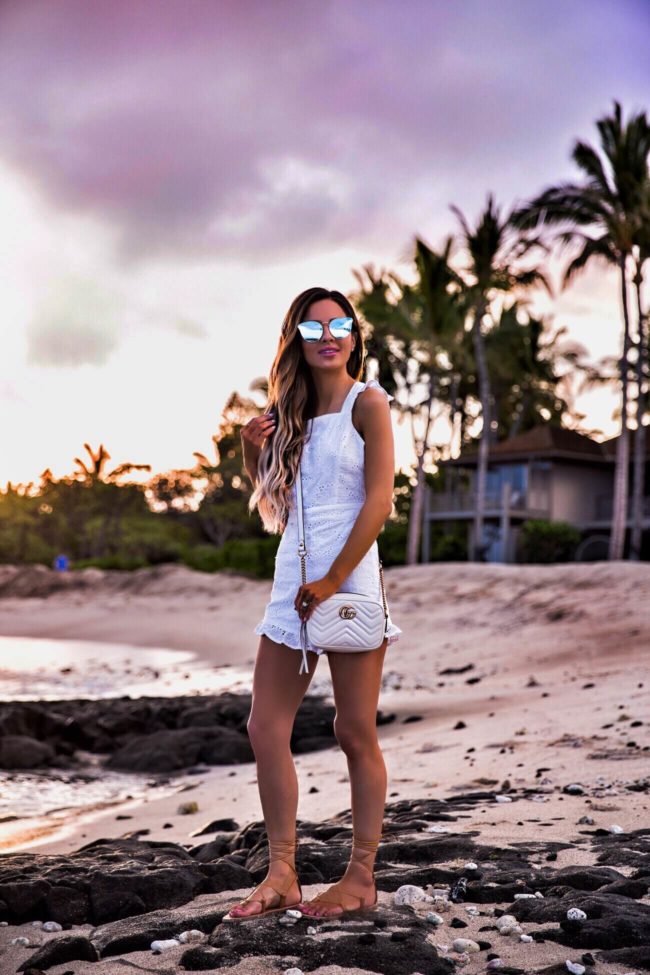 fashion blogger mia mia mine wearing a white romper by j.o.a. at the four seasons resort hualalai on the big island hawaii