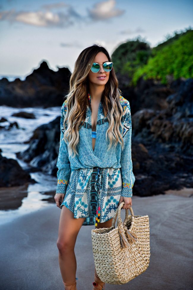 fashion blogger mia mia mine wearing a beach coverup by rocco sand and quay blue sunglasses