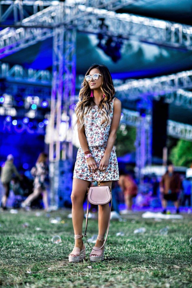 fashion blogger mia mia mine wearing a printed romper at bottlerock in napa