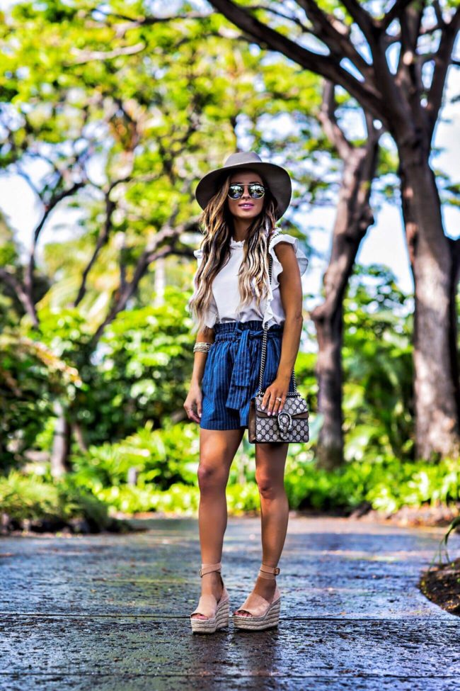 mn fashion blogger mia mia mine wearing a moon river top from nordstrom and a gucci dionysus bag