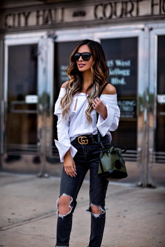 mn fashion blogger mia mia mine wearing a white button down and levi's ripped jeans from shopbop