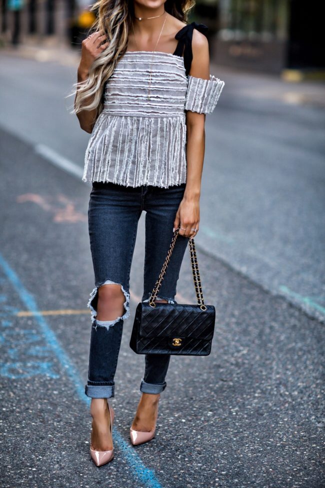 fashion blogger mia mia mine wearing a chanel bag 
